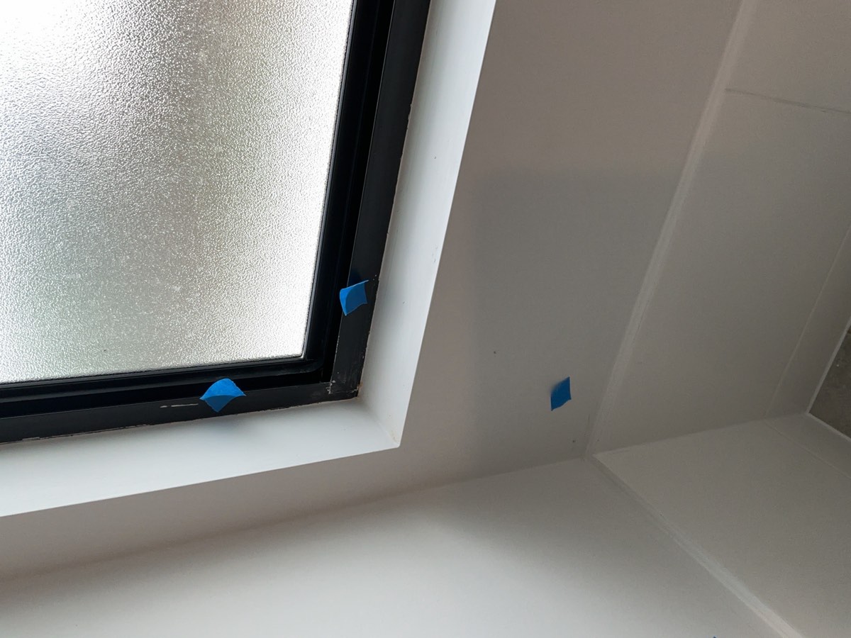 Bathroom painting, recorded during a handover inspection in Oran Park