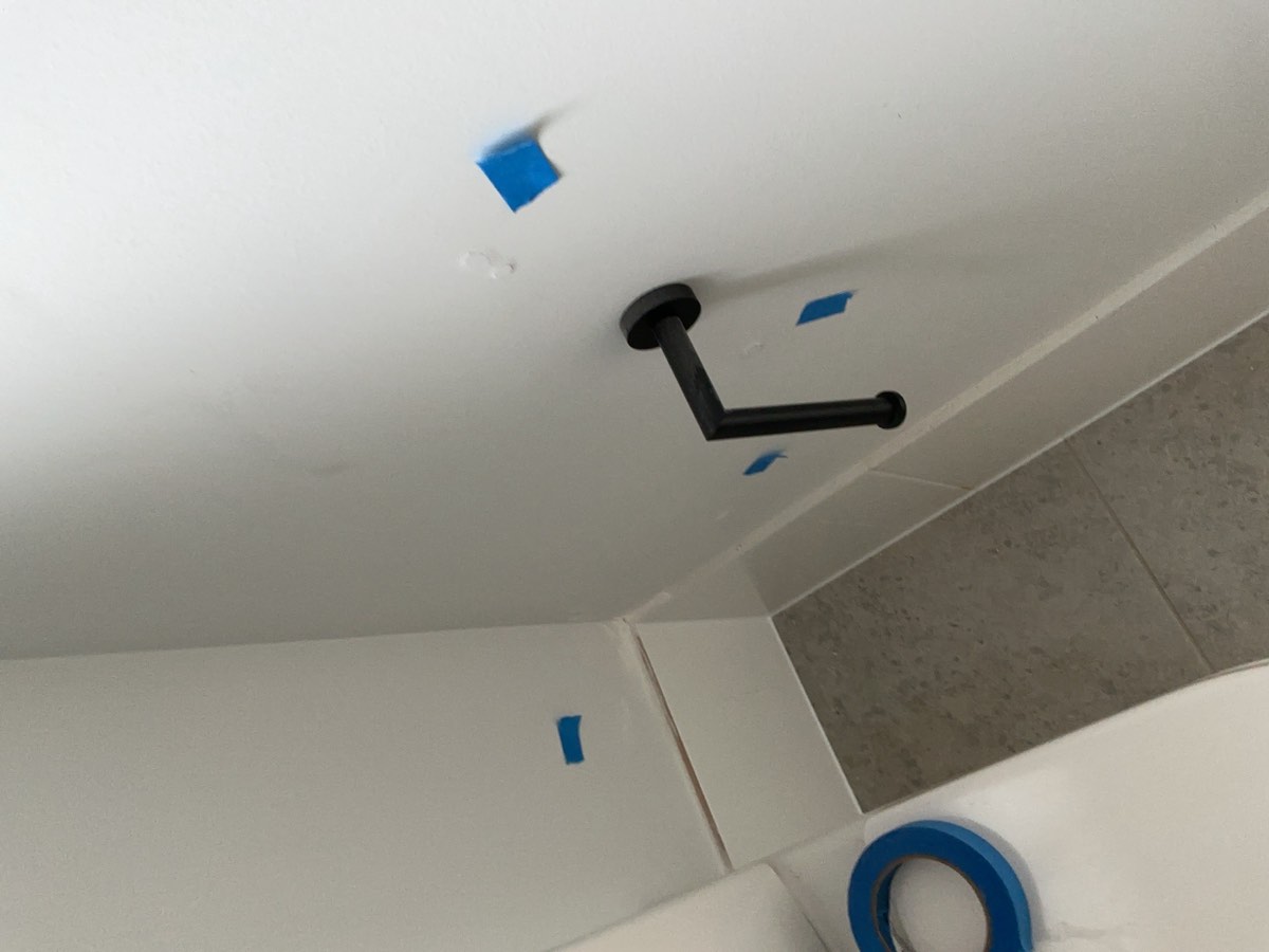 Ensuite painting, recorded during a handover inspection in Oran Park