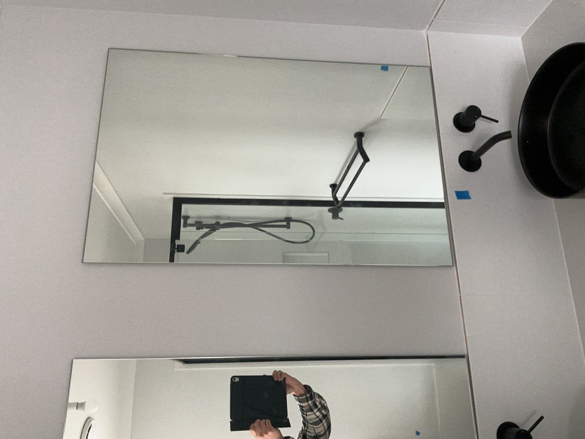 Mirror marked, recorded during a handover inspection in Oran Park