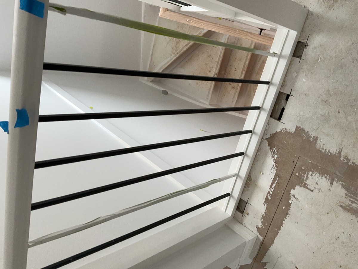 Masking tape to be removed, recorded during a handover inspection in Oran Park